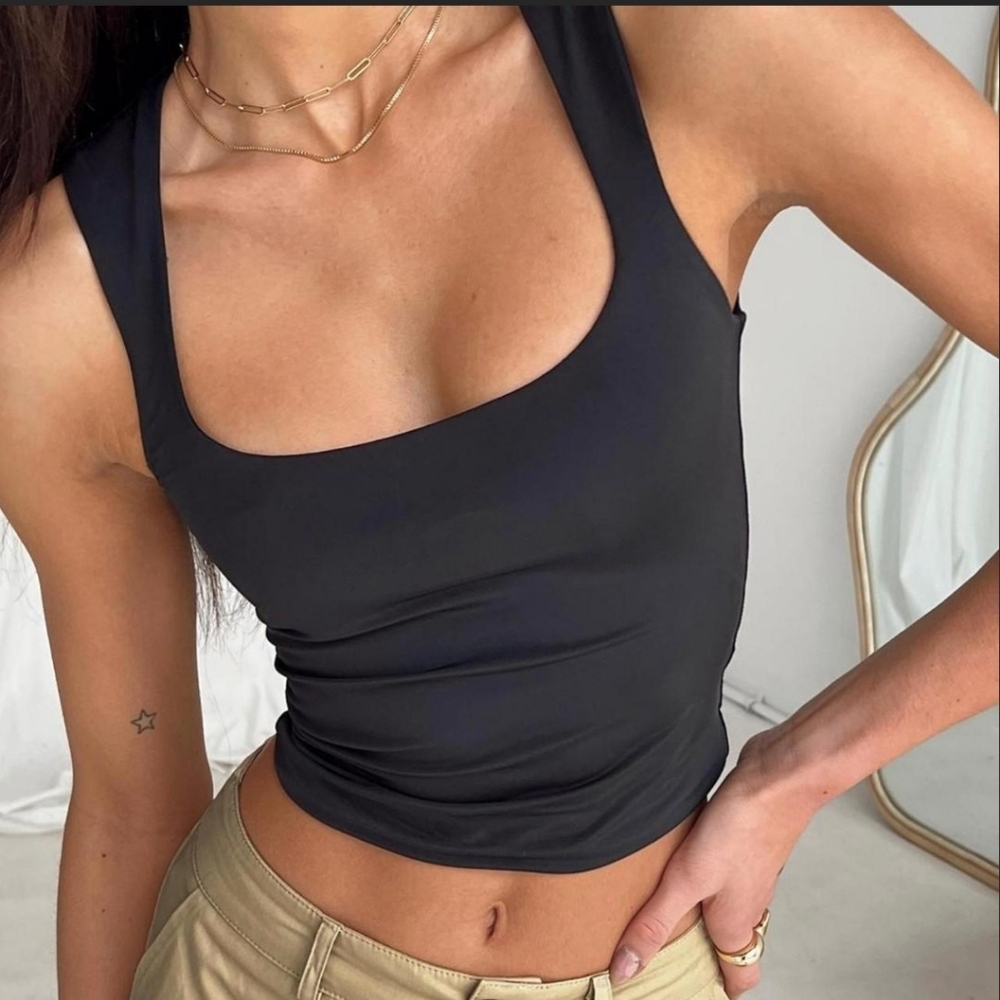Black stretchy flattering tank top by princess polly. Excellent condition.